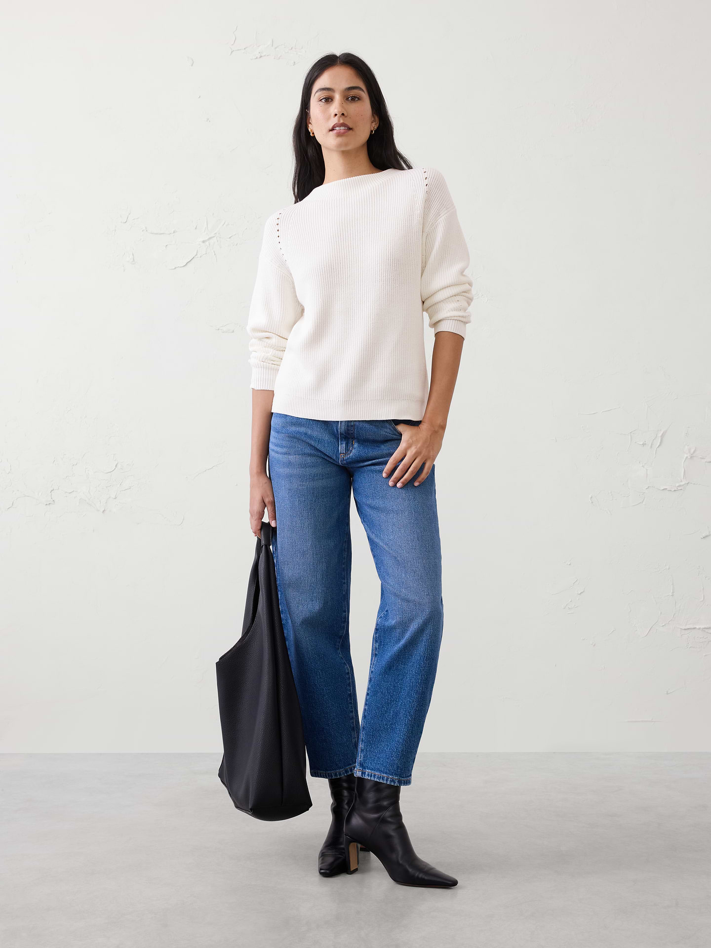 Image 1 of 4, Soft, cozy, and beautifully textured—this pullover sweater features delicate pointelle details and a relaxed, oversized fit. Made with a heavier yarn for warmth and structure, it’s perfect for layering on chilly days while still feeling effortlessly stylish., Boatneck. Long sleeves., Drop shoulders., Ribbed neck, arm cuffs and hem., Straight hem., Made exclusively for Banana Republic Factory., Product #843035