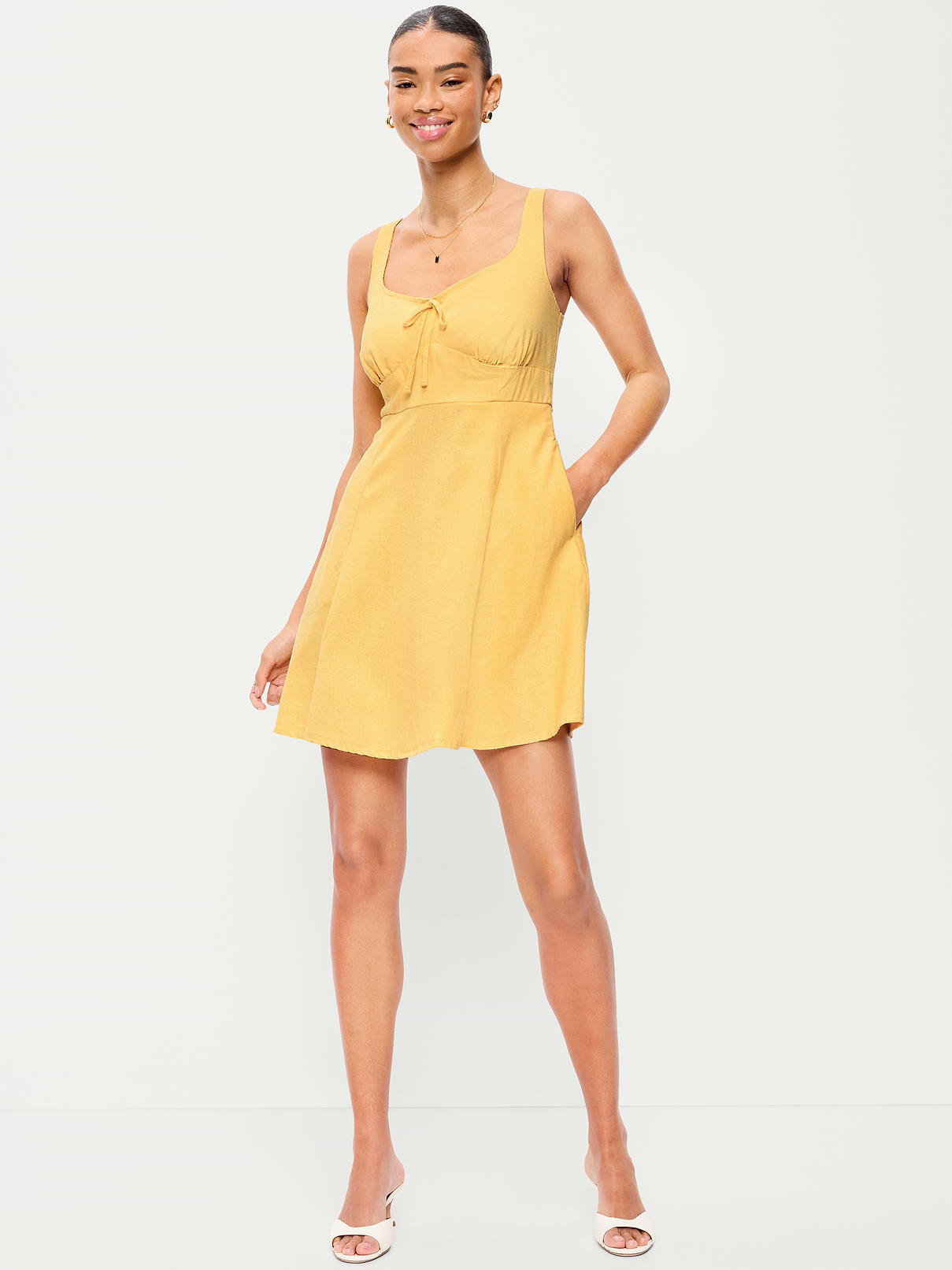 Image 1 of 9, Our strappy fit and flare that's an instant classic., sweetheart neckline, wide straps, diagonal hip pockets, hidden pockets, smocked back, seamed waist, Product #868169