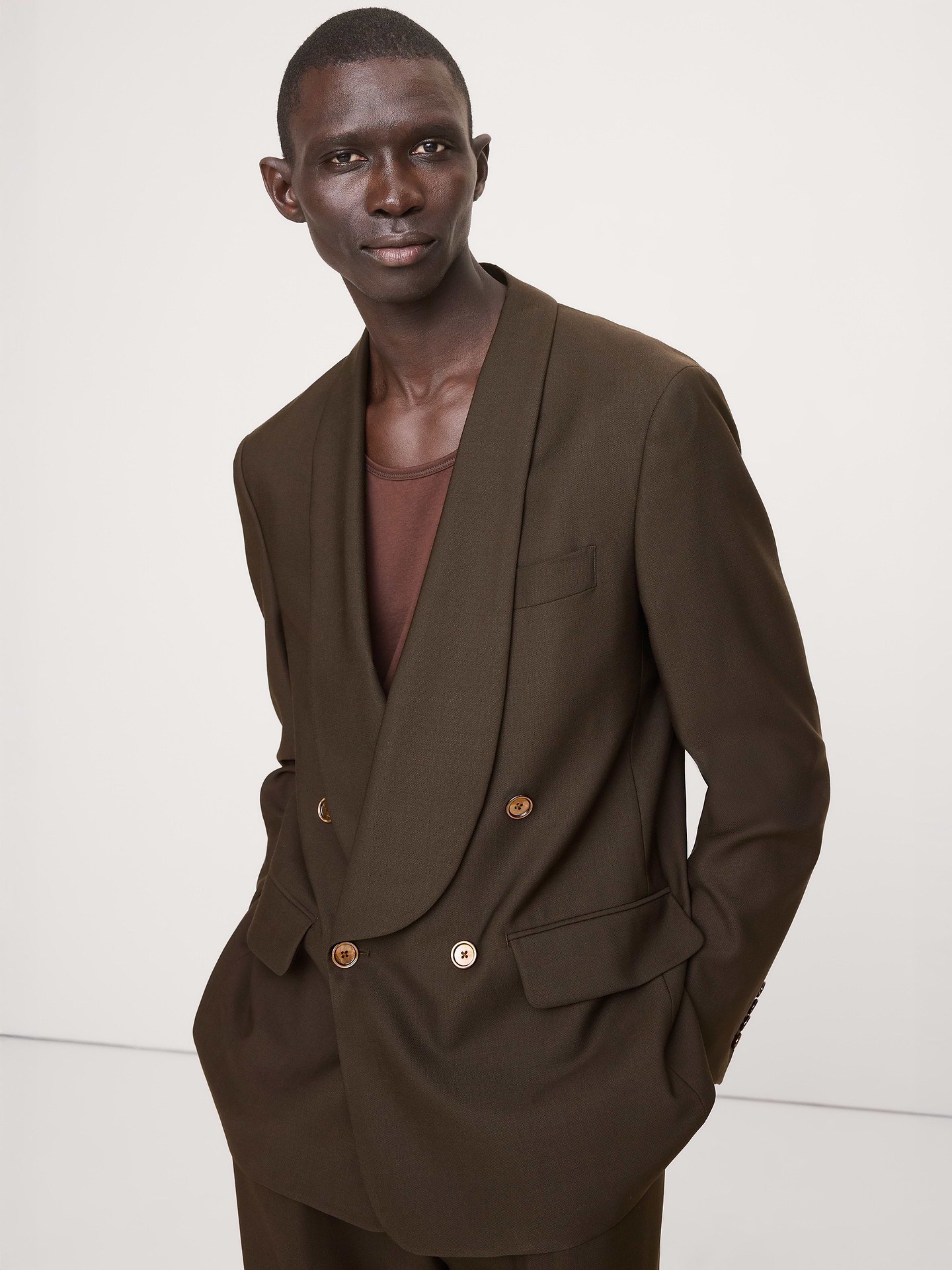 Image 1 of 7, A very cool tuxedo. We kept the fit relaxed for this shawl-collar tuxedo jacket, crafting it in a beautiful Italian wool barathea woven for us in Italy by famed Marzotto mill., Relaxed fit: Relaxed fit through shoulders, chest and waist with dropped shoulder seam., Fabric from Italy's Marzotto mill., Shawl lapel with double-breasted button front., Three exterior and three interior pockets., Double back vent., Fully lined., Product #824087