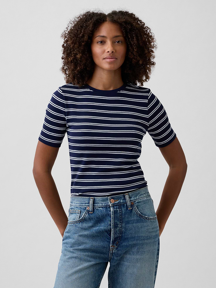 Image 1 of 5, Soft ribbed knit., Elbow-length sleeves., Crewneck., Select styles have allover stripes., This product was made in a factory that invests in gender equity and women’s empowerment through RISE. Learn more at, Product #1172521