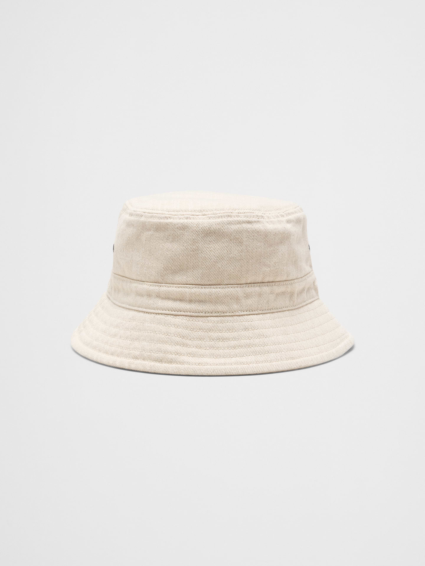 Image 1 of 2, A timeless classic, reimagined. Crafted from soft, durable denim, this bucket hat brings effortless versatility to every season. Its clean lines and relaxed brim strike the perfect balance between casual ease and elevated style. Available in a range of washes, so you can choose the shade that speaks to your individuality., Made exclusively for Banana Republic Factory., Product #855167