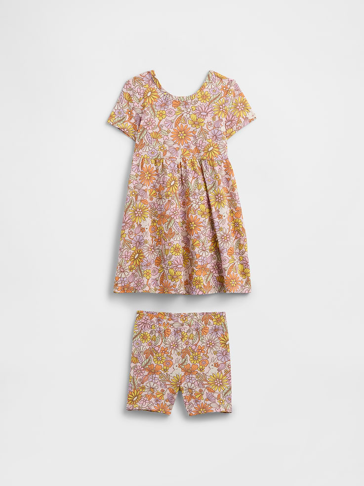 Image 1 of 3, Soft jersey knit., Short sleeves., Round neckline., Embroidered Brannan Bear at chest., Shirring at skirt waist., Elasticized waist at bottoms., Select styles have allover print., This product was made in a factory that invests in gender equity and women’s empowerment through RISE. Learn more at gapinc.com/equity., Product #1172369