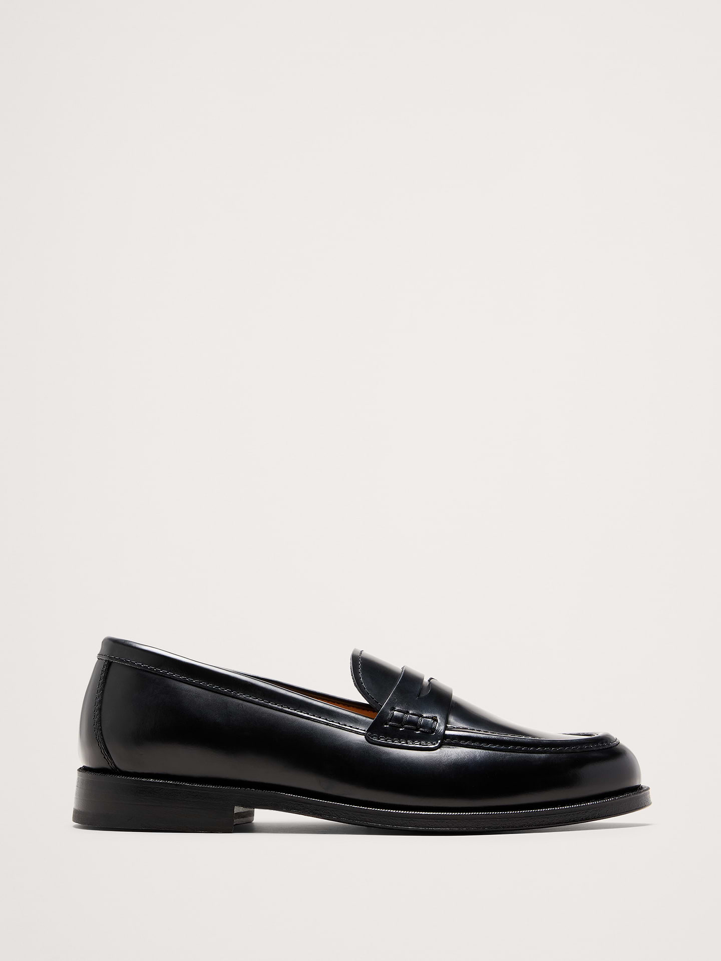 Image 1 of 6, An icon, a legend, a forever favorite...we just love a penny loafer. These have a rounded toe and a wrapped toe seam, executed in beautiful Italian leather., Italian leather uppers., Leather lining., Premium foam cushioned footbed., Leather soles., Made in Portugal., Product #853383
