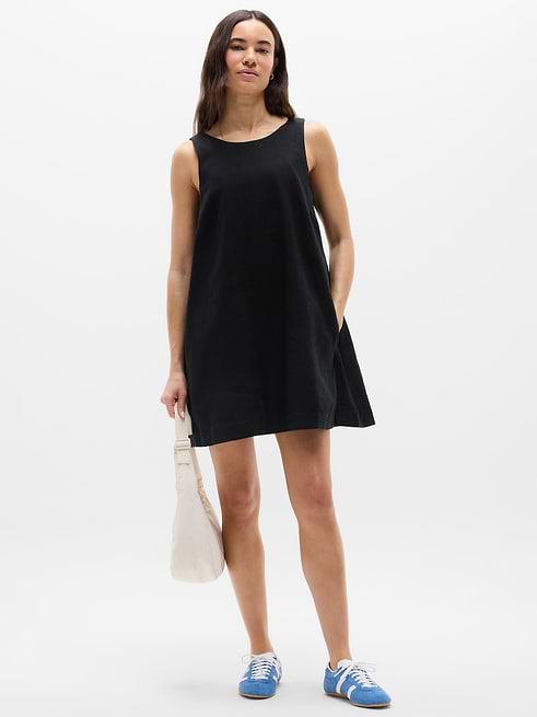 athleta black dress Size XS Cotton Blend Sleeveless Ruched Side Slit Midi Labels Resale Boutique Your workday commute and weekend travels How to Style Athleta Dress
