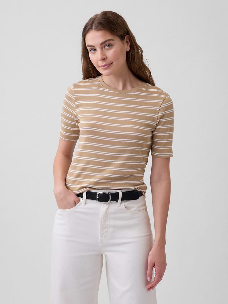 Image 1 of 5, Soft ribbed knit., Elbow-length sleeves., Crewneck., Select styles have allover stripes., This product was made in a factory that invests in gender equity and women’s empowerment through RISE. Learn more at, Product #1172521