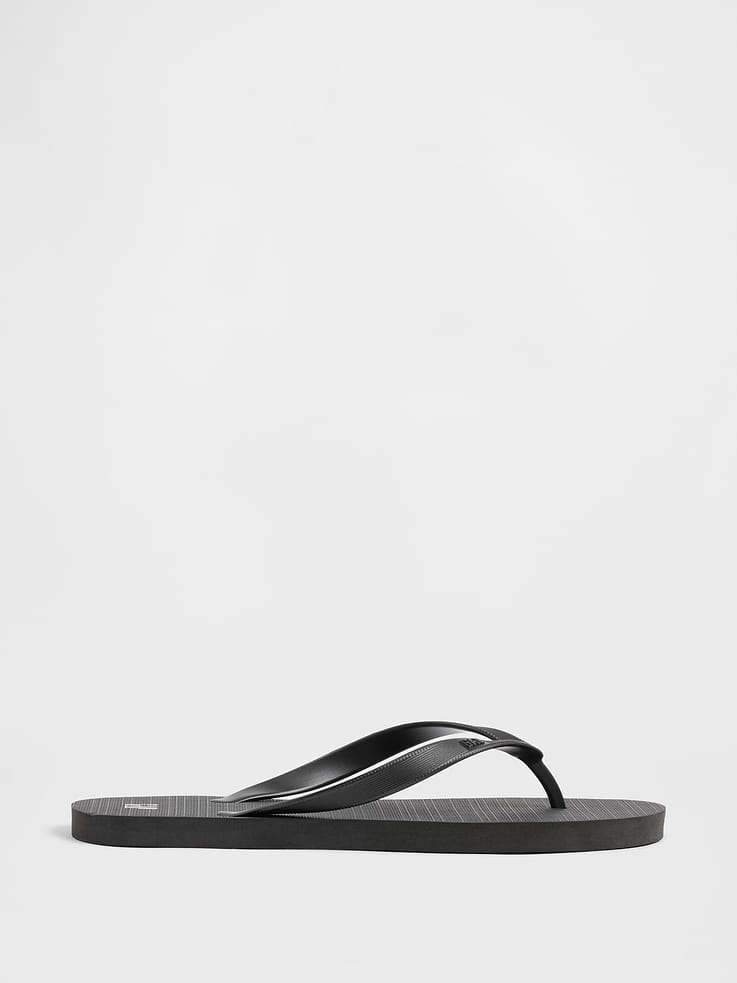 Image 1 of 5, Treaded rubber footbed and sole., Gap logo at heel., This product is not recyclable., This product was made in a factory that invests in gender equity and women’s empowerment through RISE. Learn more at, Product #1172685