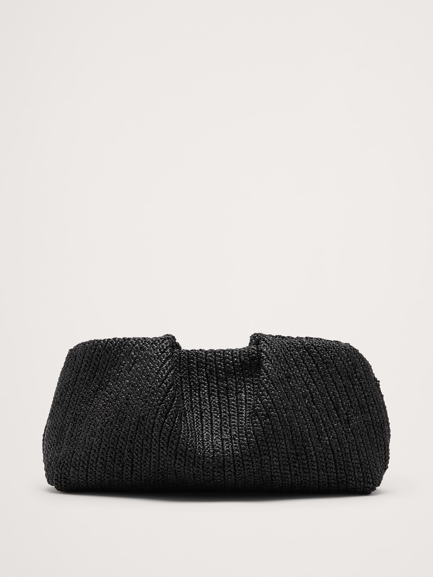Image 1 of 6, A cloud-shaped clutch, crafted here from beautiful raffia that is handwoven (so no two are exactly alike)., Magnetic clasp closure., Product #870694