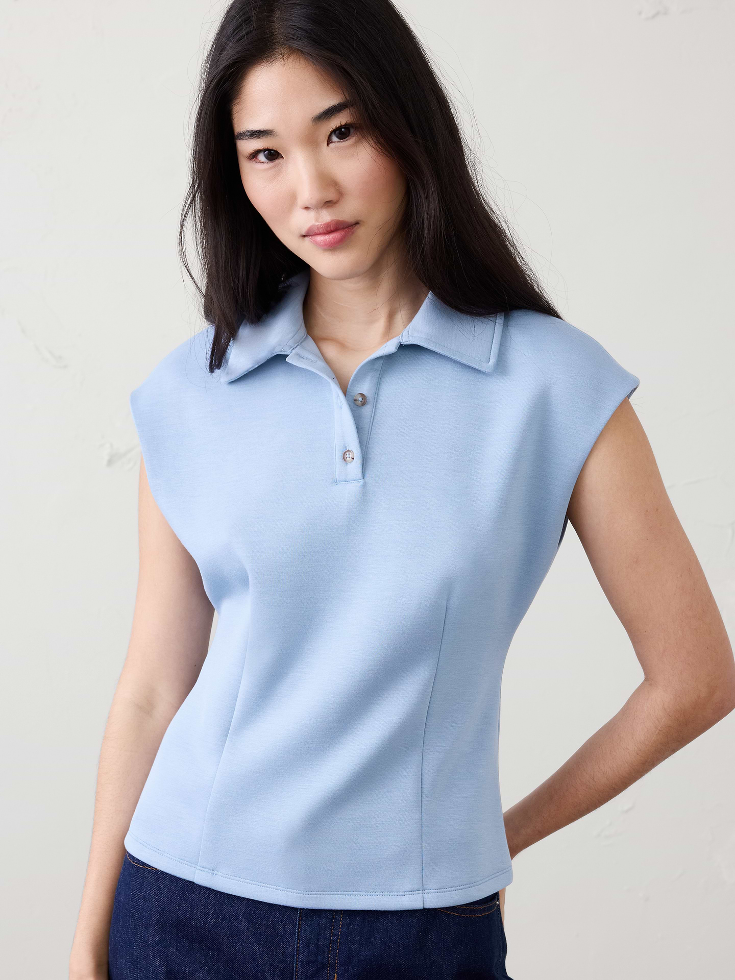 Image 1 of 7, Crafted from our best-selling soft-touch fabric — lightweight yet structured for a flattering fit., Polo collar with button placket. Cap sleeves., Fitted at the waist., Straight hem., Made exclusively for Banana Republic Factory., Product #872770