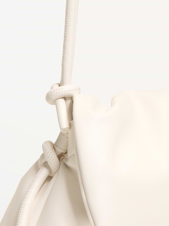 Sac à bandoulière doux et arrondi