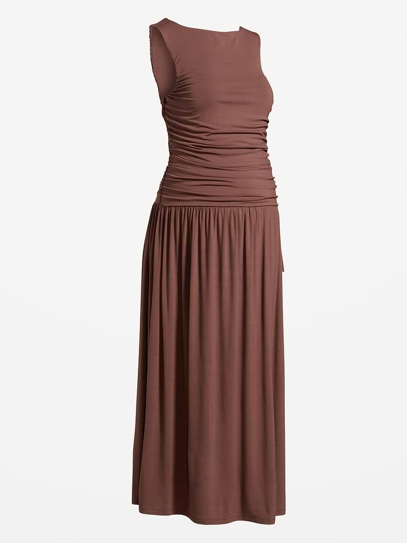 old navy pregnancy dresses Maternity V-neck Knit Black Dress Bellies to Bellies slit neck sleeveless ruched sides shirred skirt fitted at top with a full skirt hits at calf model is approx Affordable Pregnancy Dresses That Look