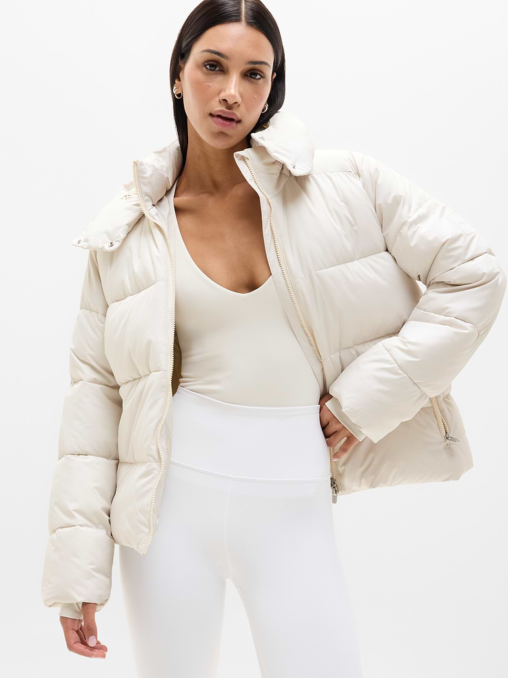 Image 1 of 8, FOR: Bundling up on your workday commute or weekend travels, from meetings to meetups, FEEL: Sleek, water-repellent shell with lofty, warm insulation, FAVE: Adjustable bungee cinch hood and hem for a custom fit, Thumbholes keep your sleeves in place, Removable hood, Side zip pockets secure your essentials, Product #768233