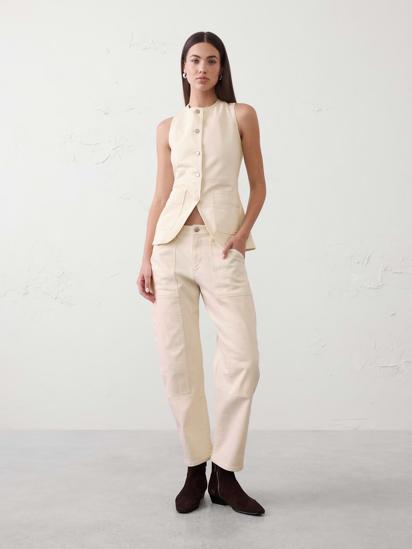 Image 1 of 4, Collarless neckline. Sleeveless., Button front closure., Front patch pockets., Yoke and waist front seams., Center back seam., Cutaway center front hem., Made exclusively for Banana Republic Factory., Product #872741