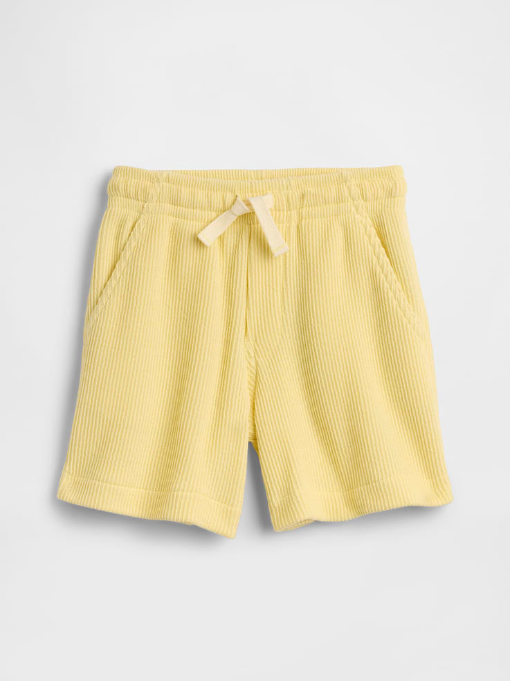 Image 1 of 3, This product is made with/contains 40% recycled polyester. Compared to virgin materials, using recycled materials helps reduce resource use and waste., Soft ribbed knit., Drawcord ties at elasticized waist, faux fly., Front slant pockets., This product was made in a factory that invests in gender equity and women’s empowerment through RISE. Learn more at, Product #1172567