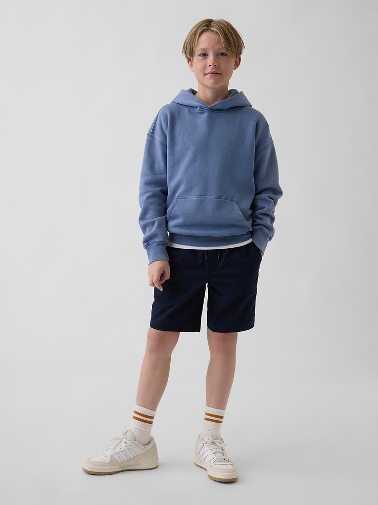 Image 1 of 5, Stretch twill cotton easy-on shorts in a relaxed fit., Elasticized waist with drawcords., Side slant pockets, back patch pockets., Made with 98% regenerative cotton which is grown using holistic agricultural practices that improve soil health, climate resilience, water retention, and local biodiversity., This product was made in a factory that invests in gender equity and women’s empowerment through RISE. Learn more at gapinc.com/equity ., Product #887319