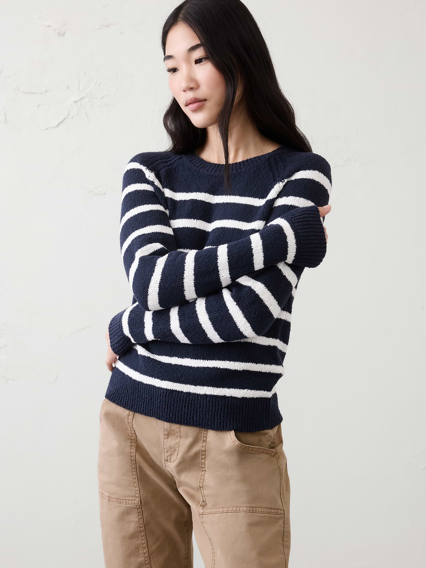 Image 1 of 7, Crafted from a soft bouclé yarn, this piece offers a uniquely dimensional surface with a lightweight yet cozy hand feel. Its easy versatility makes it the perfect layer for colder days, transitioning beautifully from season to season with effortless sophistication., Heavy gauge knit—perfect for bundling up or adding bold texture., Crew neck. Long sleeves., Ribbed neck, arm cuffs and hem., Straight hem., Made exclusively for Banana Republic Factory., Product #872791