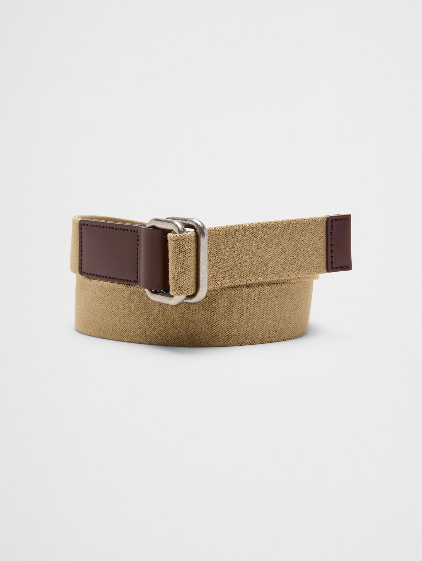 Image 1 of 1, Durable woven canvas belt., Matte black buckle with minimalist hardware., Reinforced eyelets for long‑lasting wear., Clean edge detailing for a polished finish., Contrasting interior, offering a subtle reveal of color and texture that elevates the design., Style Tip: Try it with cargo pants or utility‑inspired trousers for a sophisticated, lived‑in look., Made exclusively for Banana Republic Factory., Product #865038