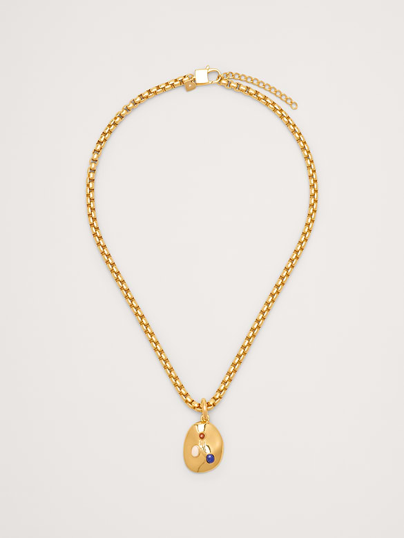 Collier à pendentif ovale serti de pierres précieuses