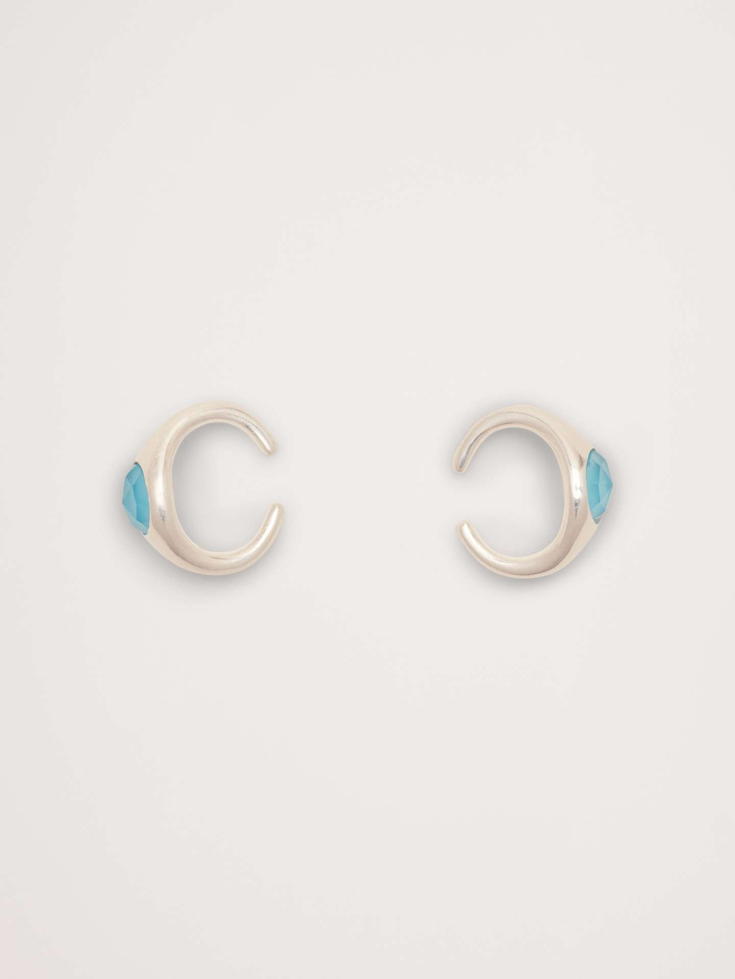 Image 1 of 1, A sparkling, sculptural statement earring in your choice of 14k-gold or 999-silver plating—no piercing required., 14k-gold or 999-silver plated brass., Blue chalcedony stones., Product #894340