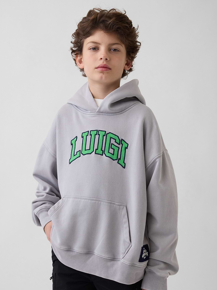 Image 1 of 5, Our softer than soft sweats. Brushed on the inside. Smooth on the outside. Made so that no two are alike., Soft cotton-blend fleece pullover hoodie., Hooded neckline., Long sleeves with drop shoulders., Kanga pocket., Banded cuffs & hem., Assorted Super Mario Bros. graphics at front and back., Product #887316