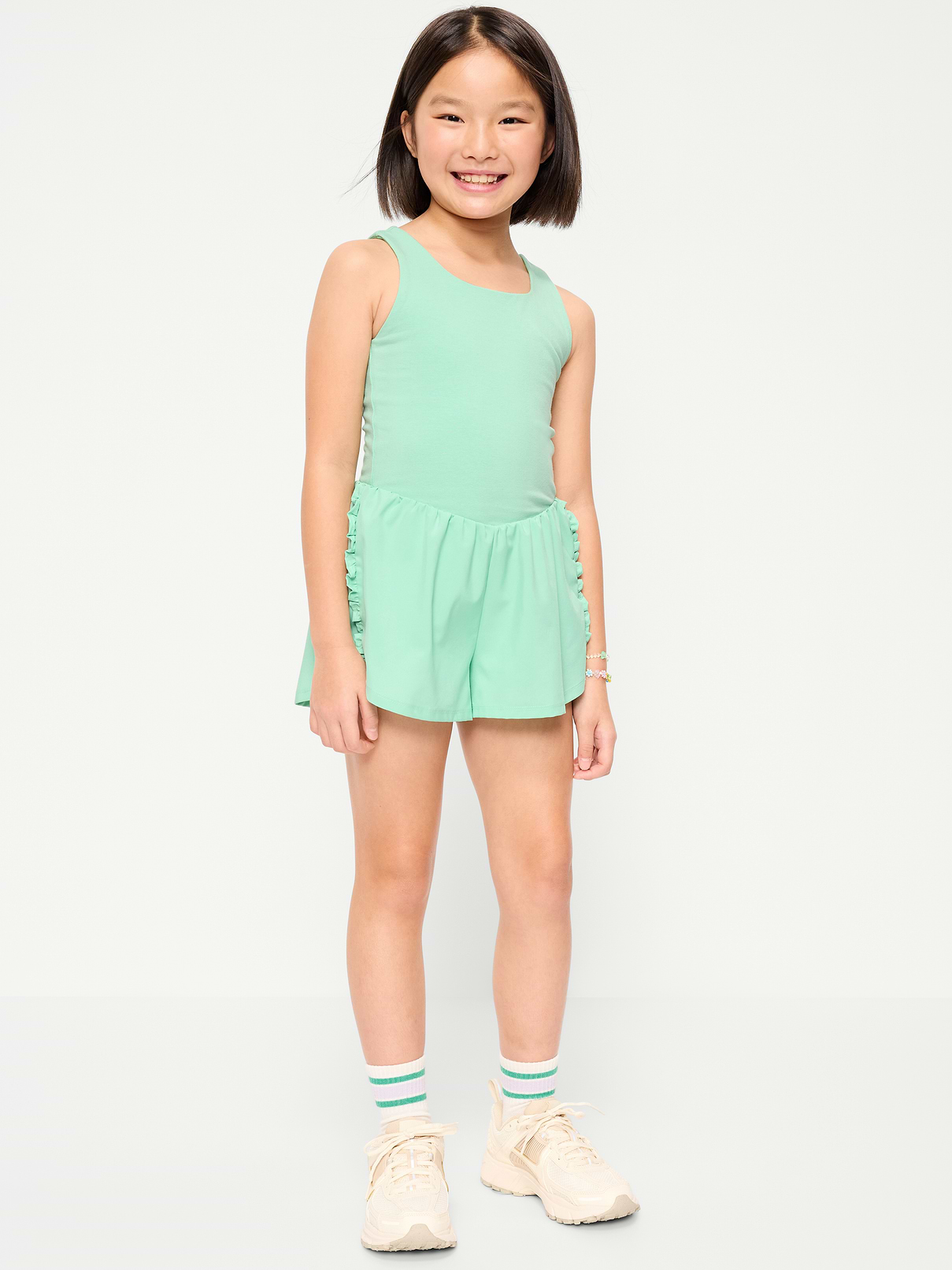 Image 1 of 5, square neckline, wide shoulder straps, deep scoop back, seamed waist, flowy exterior short with ruffle trim, built-in biker short, Product #880705