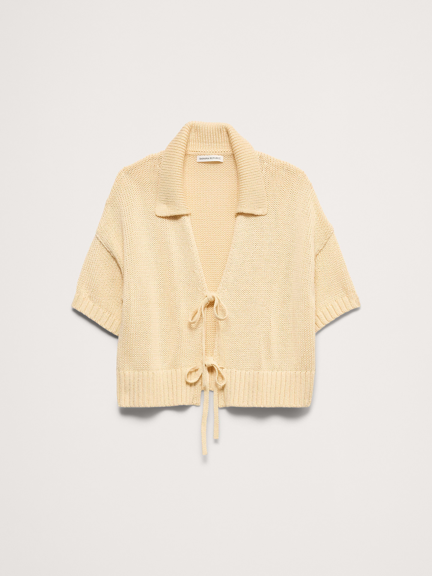 L'image numéro 3 présente Cardigan à col polo en coton noué à l’avant