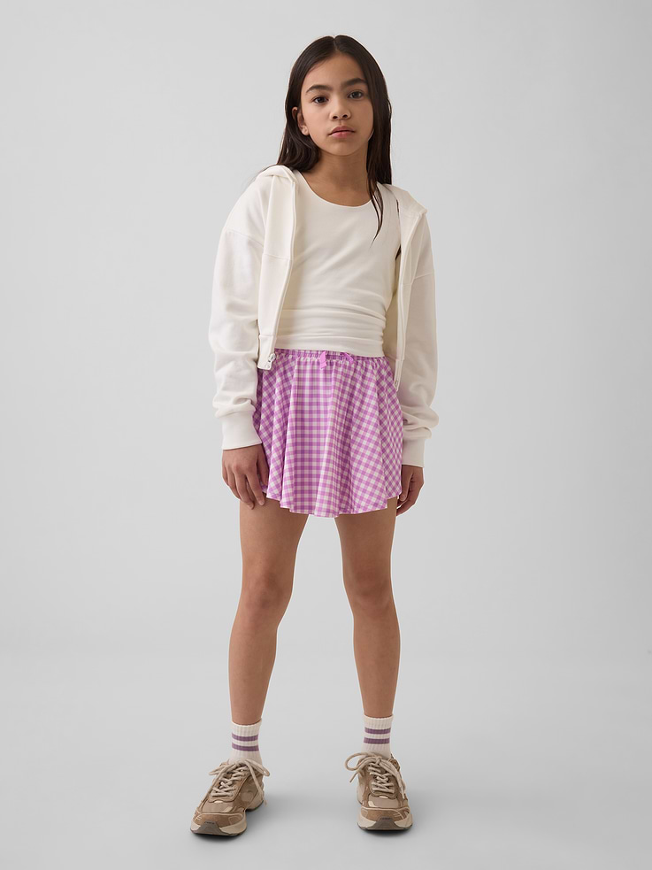 Image 1 de 5, Tricot doux et extensible., Taille élastique à cordon de serrage., Ourlet papillon., Short intégré., Certains modèles ont un motif sur l’ensemble., Ce produit a été fabriqué dans une usine qui investit dans l’égalité des genres et l’autonomisation des femmes grâce au programme Reimagining Industry to Support Equality (RISE). En savoir plus: Combler les lacunes en matière d’équité | Gap Inc. ., Produit #881693