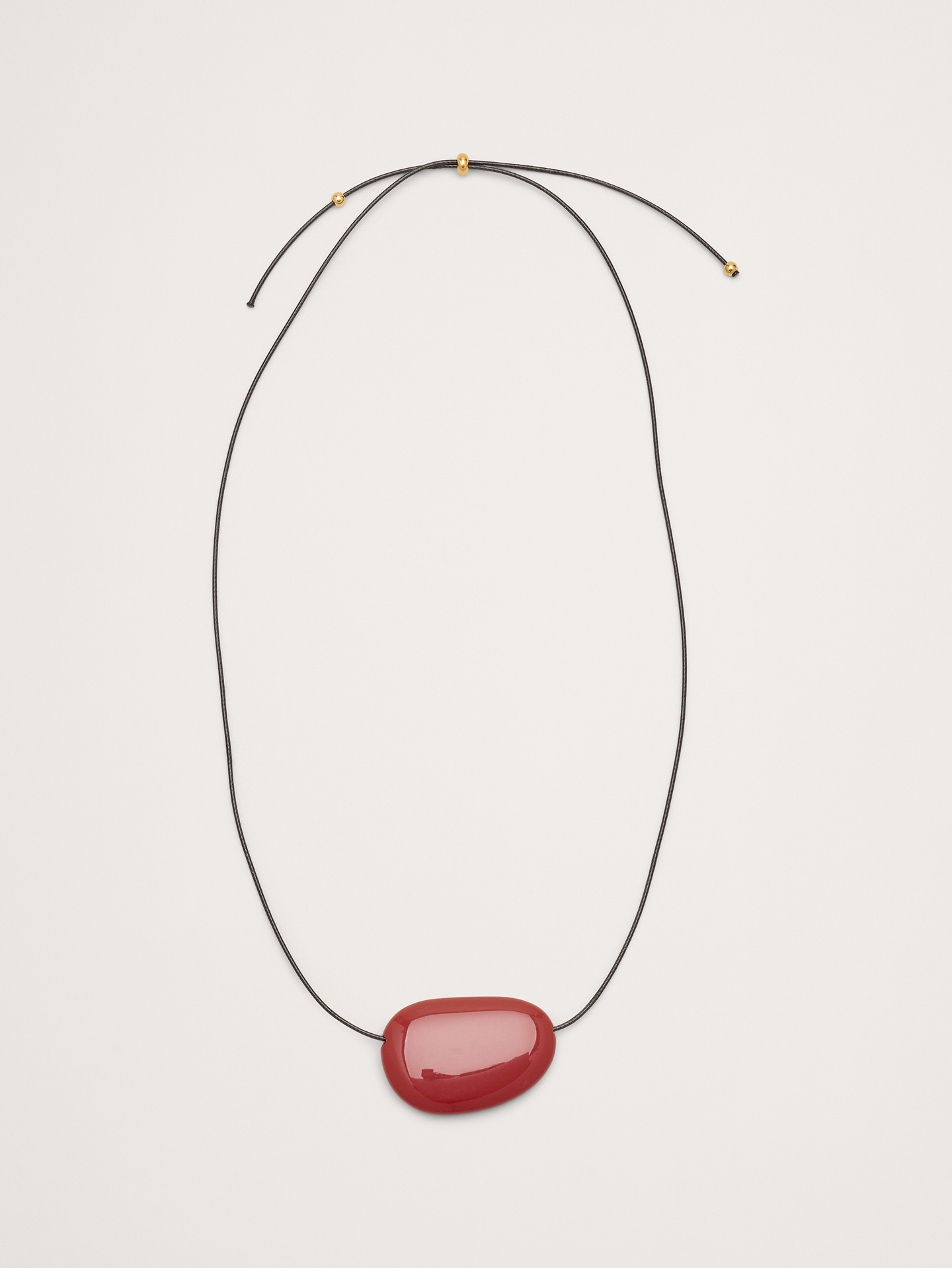 Image 1 of 3, Julia brings effortless sophistication to your daily rotation with its carefully proportioned red agate bead and clean lines., Heaven Mayhem: Los Angeles–based accessories brand creating vintage‑inspired statement pieces reimagined for the modern wardrobe—timeless, sculptural designs made to elevate everyday style., 18k-gold or silver-plated stainless steel., Red agate stone., Slider closure., Product #899770