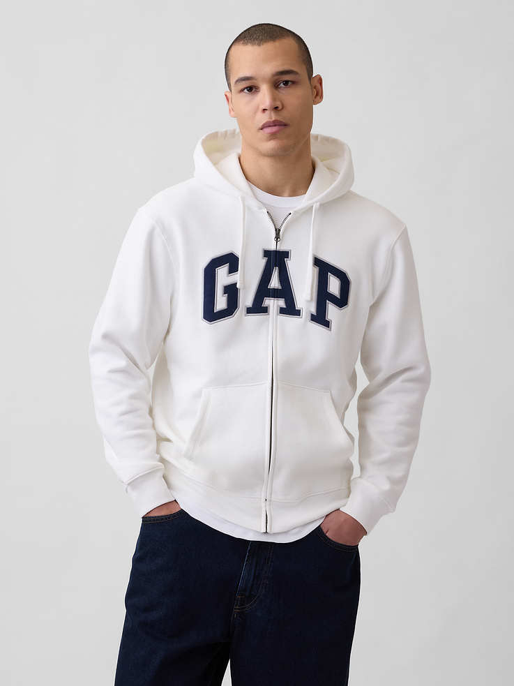Image 1 of 8, Our softer than soft sweats. Brushed on the inside. Smooth on the outside. Made so that no two are alike., Soft cotton-blend hoodie with a brushed lining., Double-layered hood with drawcords., Long sleeves., Zipper-front closure., Gap arch logo twill applique at front., Explore our GapSweats Guide ., This product was made in a factory that invests in gender equity and women’s empowerment through RISE. Learn more at gapinc.com/equity ., Product #715005