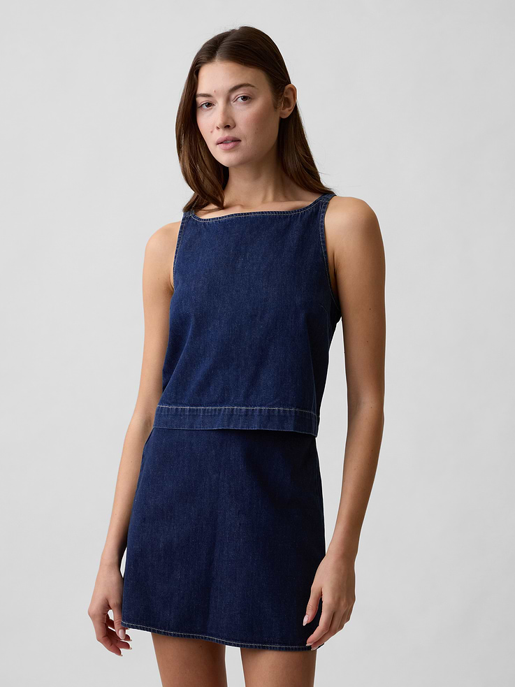 Image 1 of 5, This product is made with/contains 5% recycled cotton. Compared to virgin materials, using recycled materials helps reduce resource use and waste., This product is part of our water-saving Washwell program. Compared with conventional wash methods, Washwell uses at least 20% less water., Non-stretch denim., Dark indigo wash., Tank straps., Square neckline., This product was made in a factory that invests in gender equity and women’s empowerment through RISE. Learn more at, Product #1172458