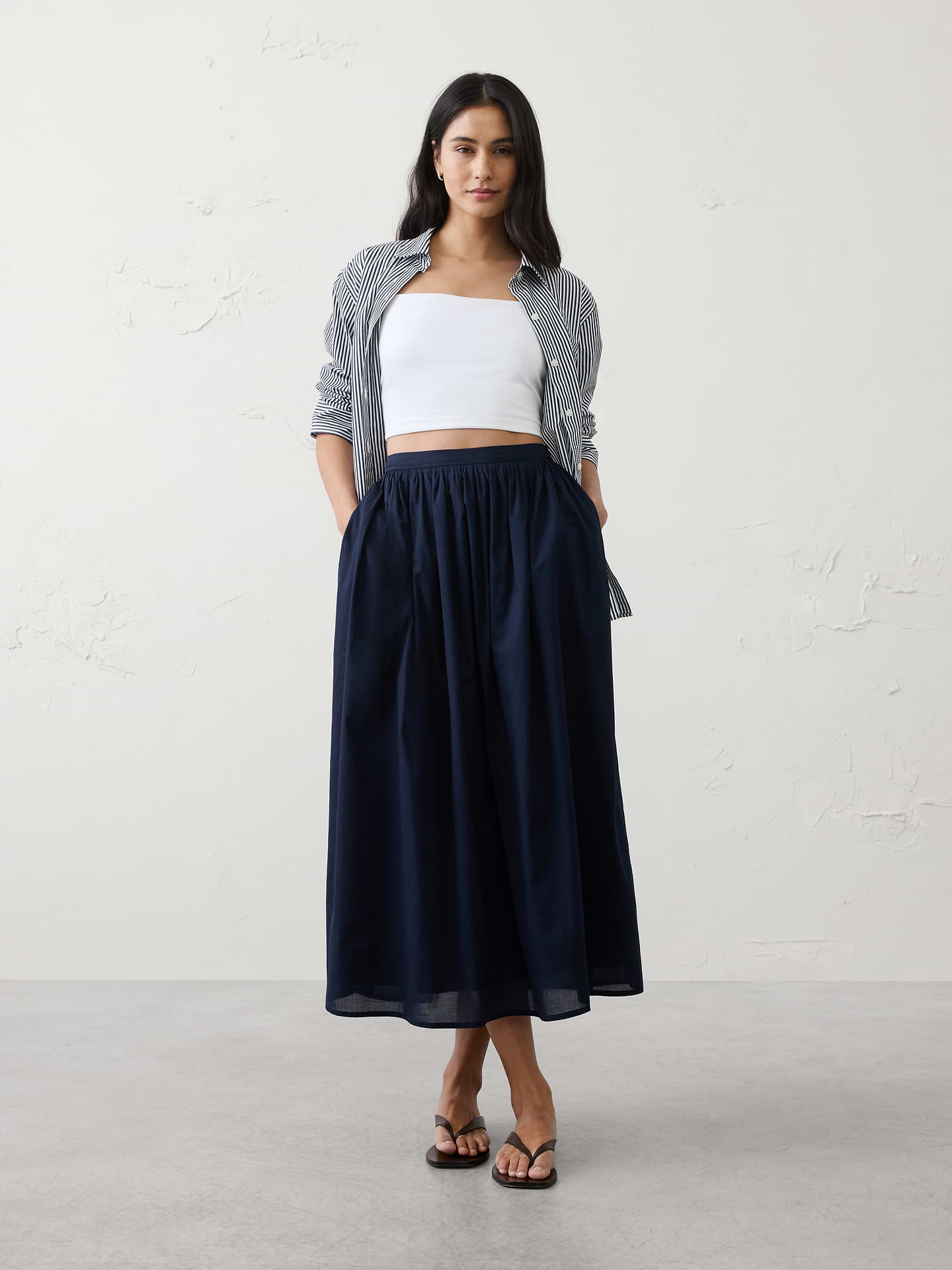 Image 1 of 1, Pull on skirt., Clean flat-front waistband with elasticized back., On seam side pockets., Fine gathers for soft volume and fluid drape., Fully lined., Made exclusively for Banana Republic Factory., Product #857374