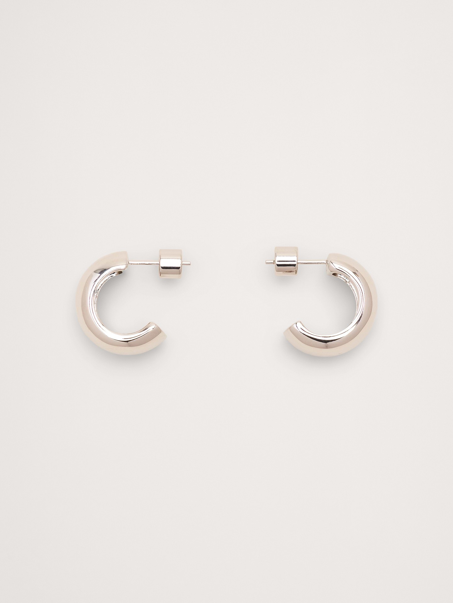 Image 1 of 3, Look closely: these bubble hoop earrings have a hollow construction (so they're light enough for all-day wear), in your choice of 14k-gold or rhodium plated brass., Martha Calvo: Miami-based jewelry brand known for bold chains, freshwater pearls, and playful, high-impact pieces made by hand. Designed to be mixed, matched, and enjoyed., 14k-gold or rhodium plated brass., Post backs., Product #899766