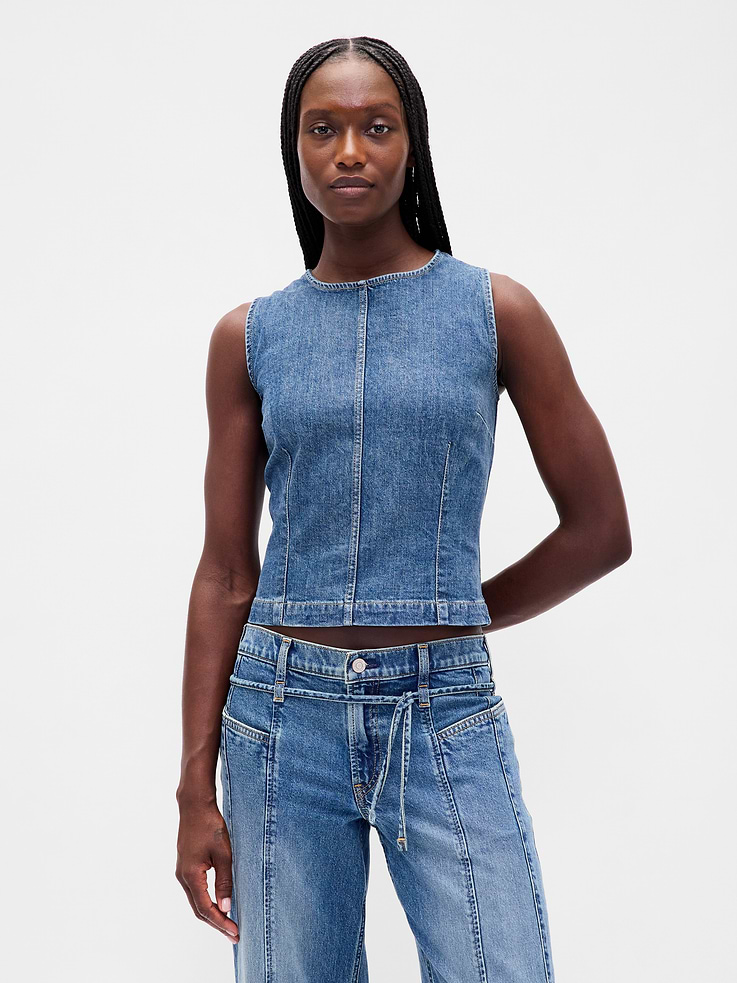 Image 1 de 3, Denim authentique légèrement extensible., Ras du cou., Sans manches., Fermeture à glissière au dos, Couture verticale et pinces à l’avant et à l’arrière., Fini indigo moyen., Produit écoresponsable: Ce modèle fait partie de notre programme d’économie d’eau Washwell. Notre programme d’économie d’eau Washwell utilise au moins 20 % moins d’eau que les méthodes de lavage conventionnelles., Un choix plus écologique: Fait de coton recyclé à 5 %. Comparativement aux matières vierges, l’utilisation de matières recyclées permet de réduire l’utilisation des ressources et le gaspillage., Produit #814079
