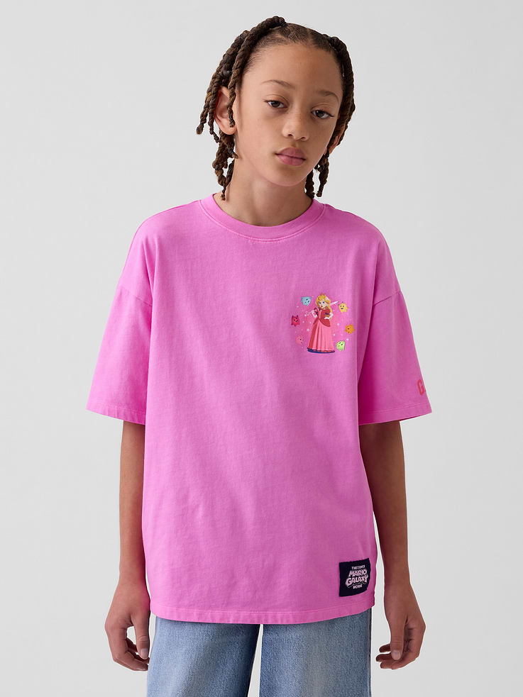 Image 1 of 5, Soft cotton jersey graphic T-shirt in a relaxed fit., Crewneck., Short sleeves with drop shoulders., Assorted Super Mario Bros. graphics at front and back., Gap logo at front or sleeve., Product #887401