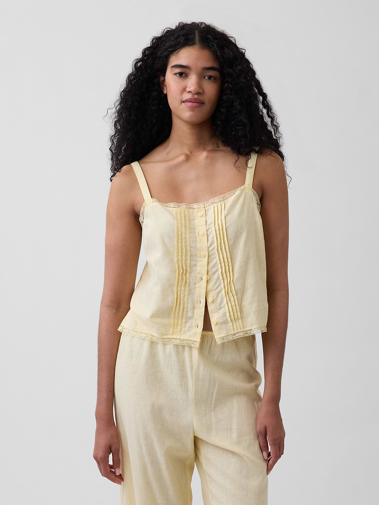 Image 1 of 4, Classic linen with the comfort turned up high. Expertly crafted for extra softness and breathability. Cut with the perfect drape., Soft linen-blend tank top in a cropped length., Square neck., Tank straps., Button front., Pintuck pleat detailing at front., Lace trim at hem., This product was made in a factory that invests in gender equity and women’s empowerment through RISE. Learn more at gapinc.com/equity ., Product #880029