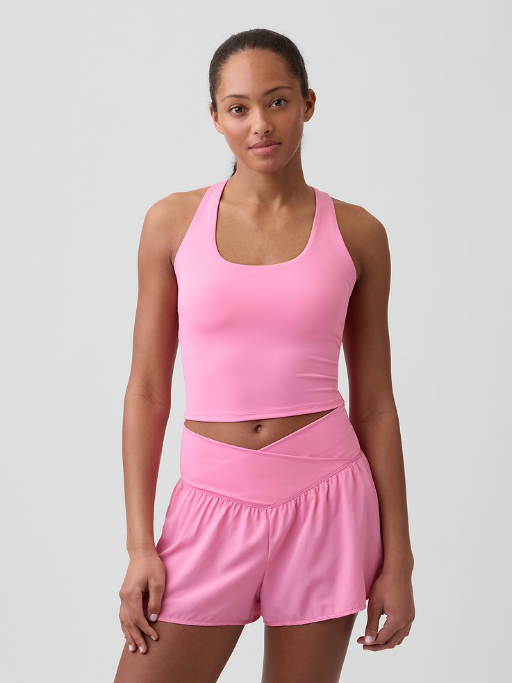 Image 1 of 5, For low intensity workouts, or hangouts., This product is made with/contains 83% recycled polyester. Compared to virgin materials, using recycled materials helps reduce resource use and waste., Breathable PowerYou matte stretch knit., Moisture Wicking helps keep your skin dry., Four-way stretch allows freedom of movement while providing superior shape retention., Racerback straps., Scoopneck., Elasticized hem., This product was made in a factory that invests in gender equity and women’s empowerment through RISE. Learn more at, Product #1174932
