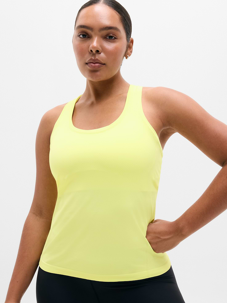 Image 1 of 6, FOR: Medium to high-impact workouts at the gym, studio, or outdoors, FEEL: Enhanced yarns deliver soft stretch and quick recovery, keeping you comfortable while you push your limits, FAVE: The workout top you love, now with upgraded stretch, sweat-wicking power, and sleek style, Seamless construction for minimal chafing, Functional mesh panels allow for optimal movement and breathability, Grippers at inner hem prevent it riding up, Product #845696