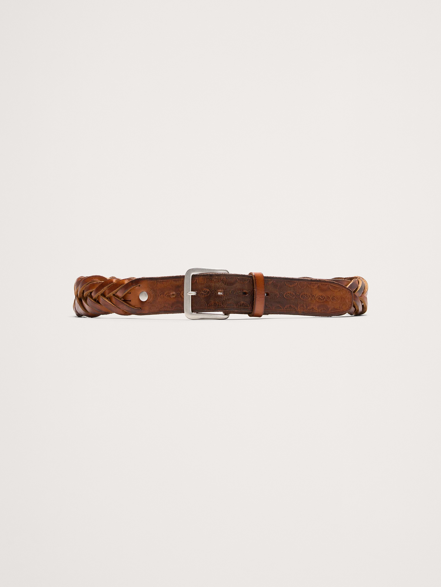 L'image numéro 1 présente Ceinture en cuir repoussé tressé