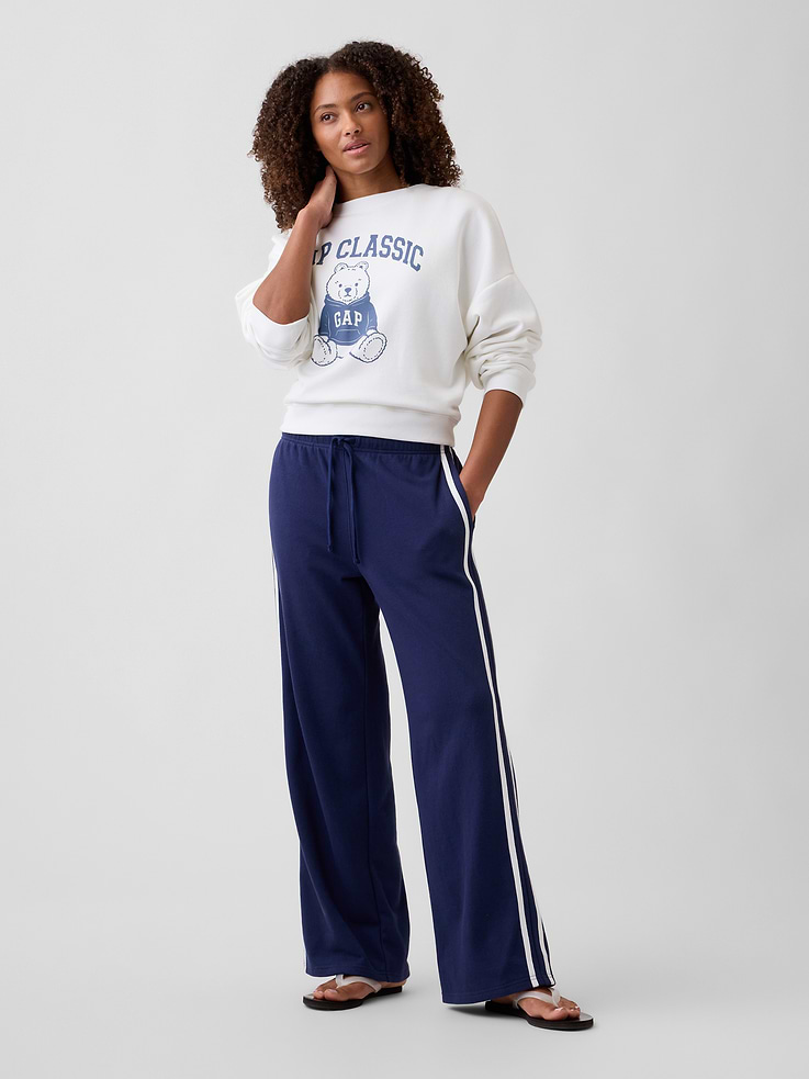 Image 1 of 5, This product is made with/contains 23% recycled polyester. Compared to virgin materials, using recycled materials helps reduce resource use and waste., Soft French terry., Drawcord ties at elasticized waist., On-seam pockets., Stripes at sides., This product was made in a factory that invests in gender equity and women’s empowerment through RISE. Learn more at, Product #1178402