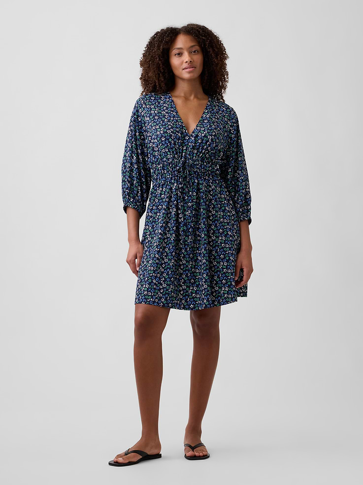 Image 1 of 6, Smooth weave., Three-quarter sleeves with elasticized cuffs., Shirring at V-neck., Drawcord ties and smocking at yoke., On-seam pockets., Select styles have allover print., This product was made in a factory that invests in gender equity and women’s empowerment through RISE. Learn more at, Product #1174900