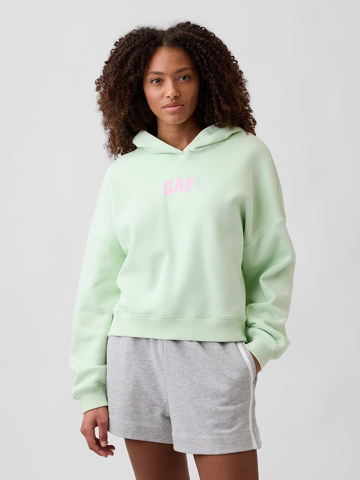 Image 1 of 5, Soft, comfy fleece., Dropped shoulder, long sleeves with banded cuffs., Hood., Gap logo at front., Banded hem., Note: The dye used in the crafting of this product is prone to crocking, or color transfer. Please avoid contact with light-colored fabric or upholstery., Product #430551