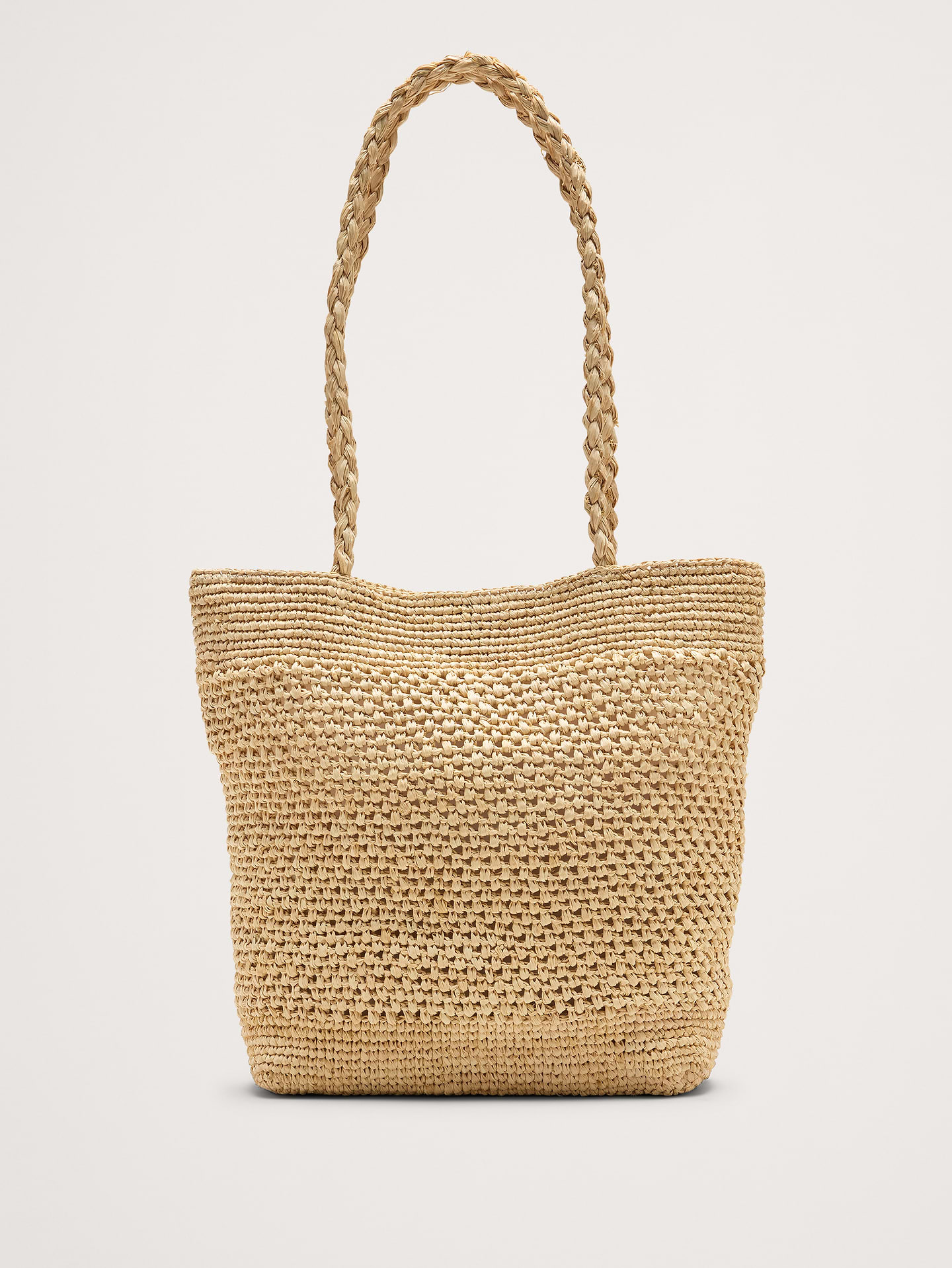 Image 1 of 6, Crafted from raffia with a textile lining, this lightweight and versatile bag is the perfect addition to sunny days and weekend escapes., Hat Attack: Crafting sustainable, stylish hats & accessories since 1981. Family-run, with modern designs rooted in artisanal heritage., Product #914646