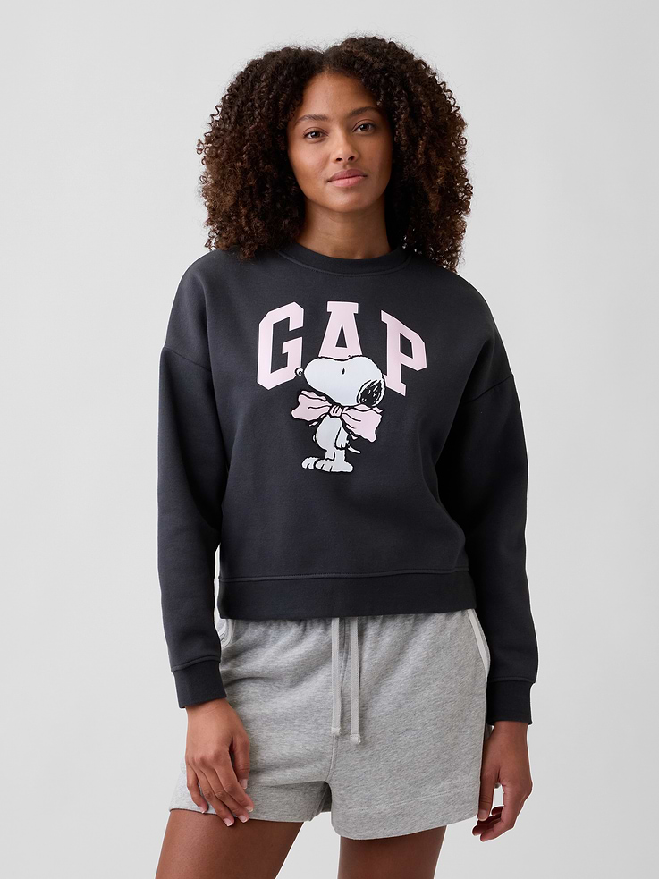 Image 1 of 5, Soft, comfy fleece., Dropped shoulder, long sleeves with banded cuffs., Crewneck., Gap logo with graphic at front., Banded wedge hem., Product #1174939