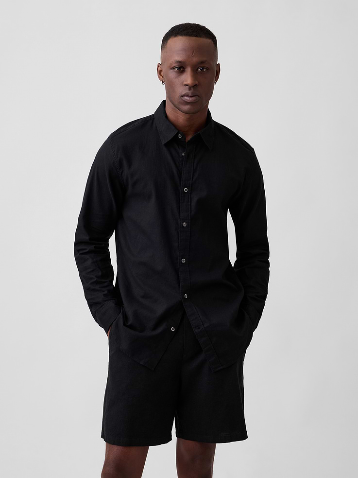 Image 1 of 5, Smooth linen blend., Long sleeves with button cuffs., Spread collar, button front., Curved shirttail hem is longer at back., Select styles have allover print or stripes., This product was made in a factory that invests in gender equity and women’s empowerment through RISE. Learn more at, Product #1172696