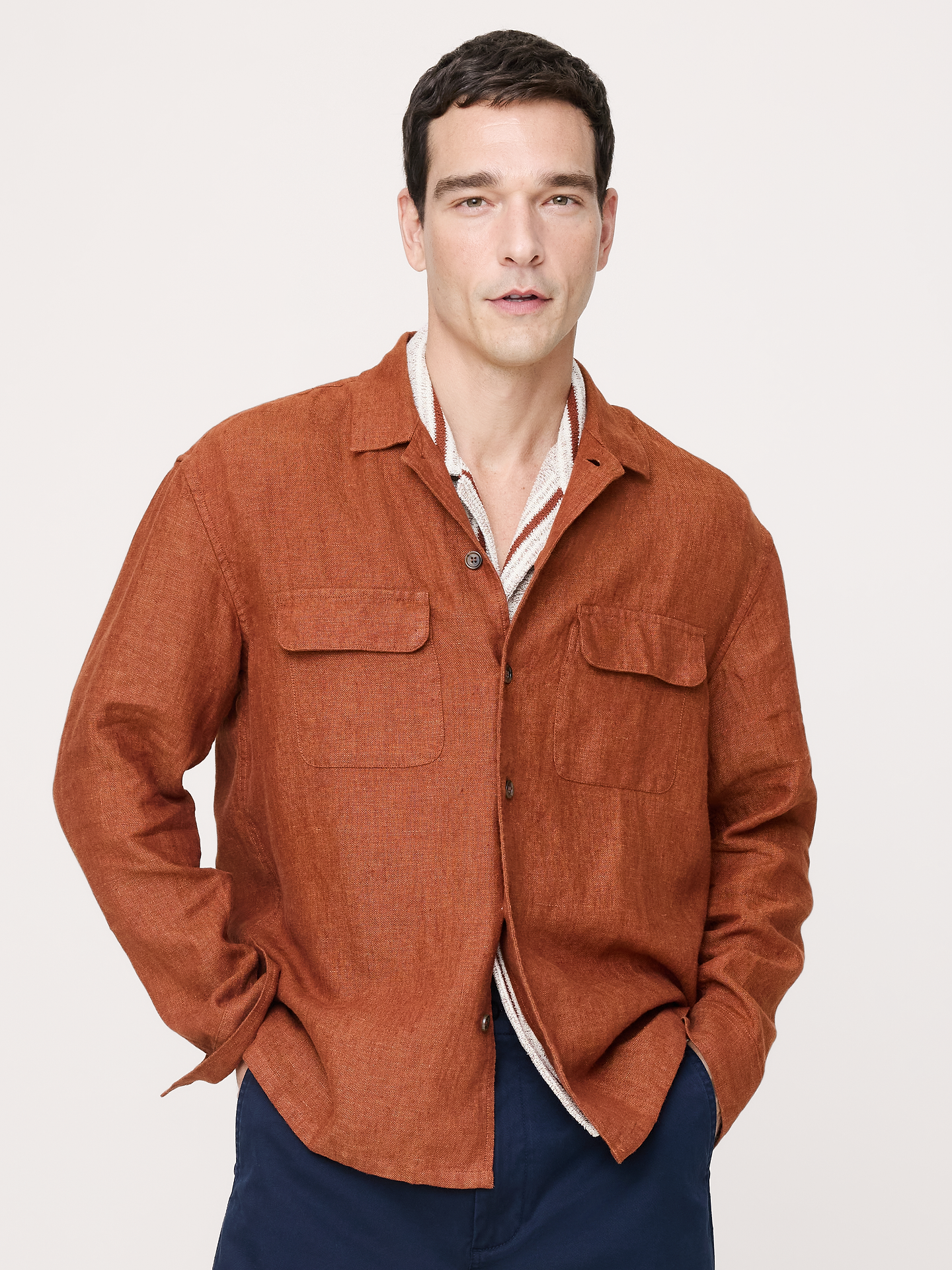 Image 1 of 6, An at-ease take on the classic button-down shirt, we added a resort collar here and kept the fit relaxed for a modern look—in our best-selling 100% linen., Relaxed Fit: A straight & roomy fit with a dropped shoulder seam., Resort collar with button front., Chest pockets., Straight hem., Product #869238