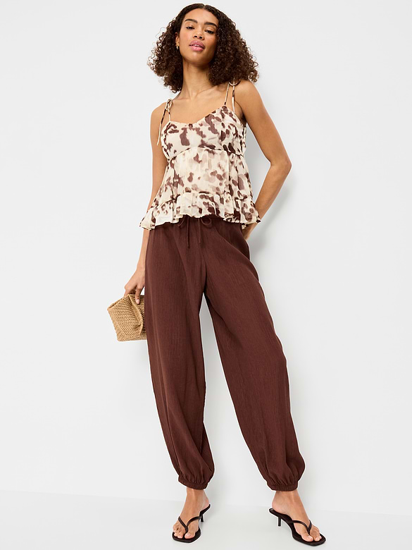 Camisole en mousseline semi-diaphane à bretelles nouées