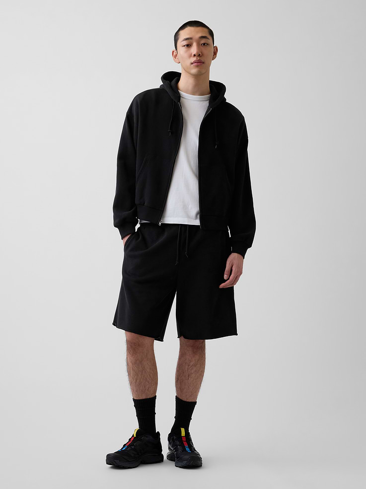 Image 1 of 7, Our softer than soft sweats. Brushed on the inside. Smooth on the outside. Made so that no two are alike., Soft cotton-blend fleece sweat shorts in a relaxed fit., Elasticized waist with drawcords., Side on-seam pockets, back patch pocket., Made with 52% Protocol cotton verified by the U.S. Cotton Trust Protocol, a program which works with farms committed to improving their environmental footprint by minimizing water usage and improving soil diversity (Claim No. 10127)., Made with 23% recycled polyester. Compared to virgin materials, using recycled materials helps reduce resource use and waste., Explore our GapSweats Guide ., This product was made in a factory that invests in gender equity and women’s empowerment through RISE. Learn more at gapinc.com/equity ., Product #899460