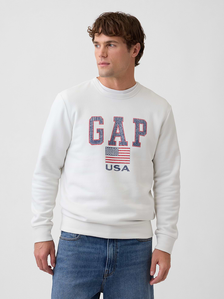 Image 1 of 7, Soft, comfy fleece., Long sleeves with banded cuffs., Crewneck., Gap logo at front., Banded hem., Product #523890