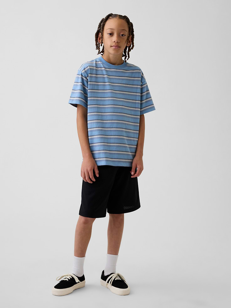L'image numéro 1 présente Short de sport en maille pour Enfant, entrejambe de 20 cm