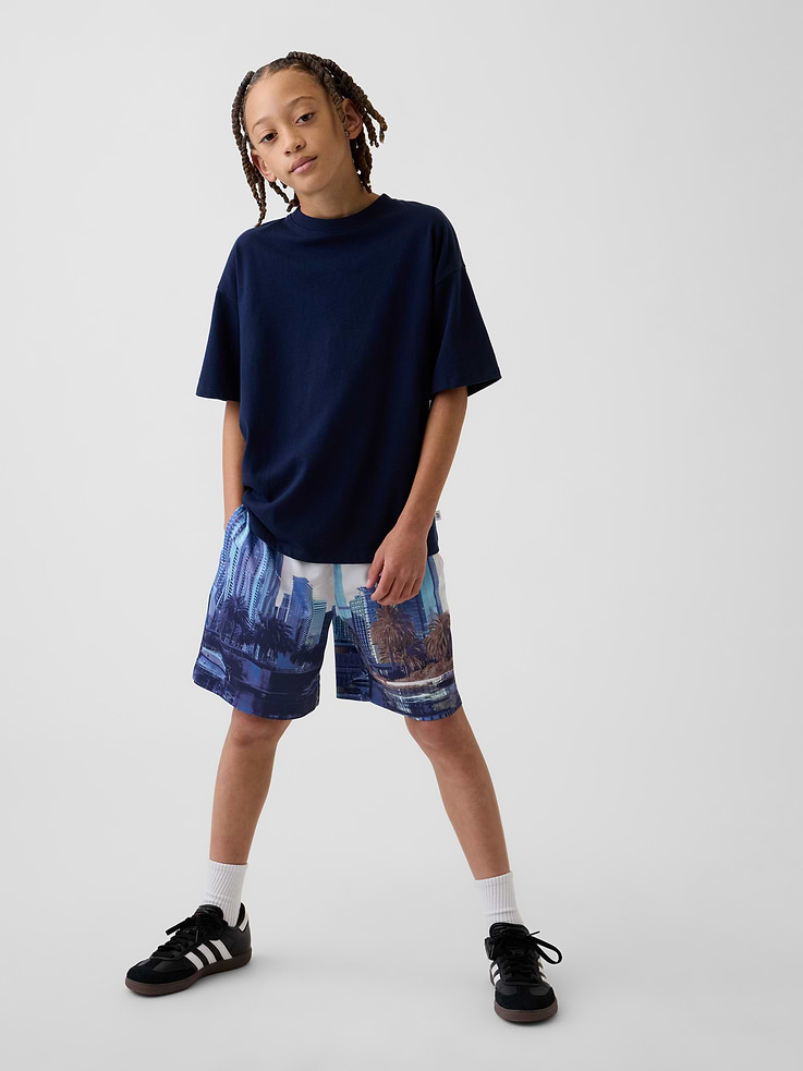 Image 1 of 5, Soft mesh knit pull-on shorts., Elasticized waist with drawcords., Side welt pockets., Made with 100% recycled polyester. Compared to virgin materials, using recycled materials helps to reduce resource use and waste., This product was made in a factory that invests in gender equity and women’s empowerment through RISE. Learn more at gapinc.com/equity ., Product #745895