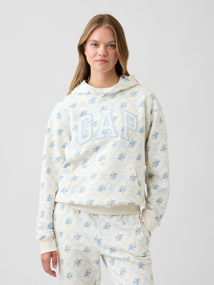 Image 1 of 5, This product is made with/contains 23% recycled polyester. Compared to virgin materials, using recycled materials helps reduce resource use and waste., Soft, comfy fleece., Dropped shoulder, long sleeves with banded cuffs., Drawcord ties at hood., Gap logo at front., Kanga pocket., Banded hem., Note: The dye used in the crafting of this product is prone to crocking, or color transfer. Please avoid contact with light-colored fabric or upholstery., Product #839432